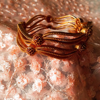 B016_Classy Style Gold Plated Bangles studded  with pink ruby stones.