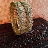 B014_Classy Style Gold Plated Bangles studded  with American Diamond stones.
