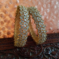 B014_Classy Style Gold Plated Bangles studded  with American Diamond stones.