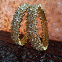 B014_Classy Style Gold Plated Bangles studded  with American Diamond stones.