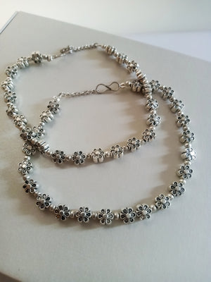 N0342_ Trendy oxidized crafted flower anklets with delicate craftwork.