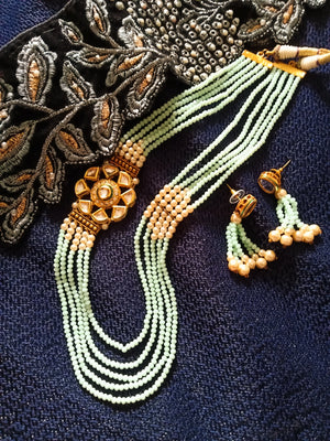 N08_Gorgeous baby blue colored crystal Necklace studded with semi precious stones.