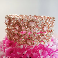 B0213_S_Elegant flowery design Bangles studded with American Diamond stones with a touch of pink stones with delicate stone work.