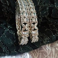 B0217_Beguiling american diamond bangles with delicate art work.