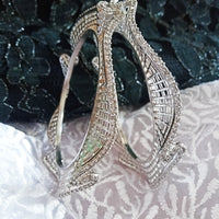 B0215_Elegant trendy designer bangles with delicate designs and unique patterns studded with american diamond stones.