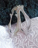 B0215_Elegant trendy designer bangles with delicate designs and unique patterns studded with american diamond stones.