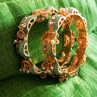 B0220_Gorgeous bangles with vibrant Meena work with a touch of semi precious stones and bead drops.