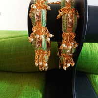 B0220_Gorgeous bangles with vibrant Meena work with a touch of semi precious stones and bead drops.