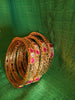 B0221_Beautiful golden bangles with delicate craftwork with a touch of stones.