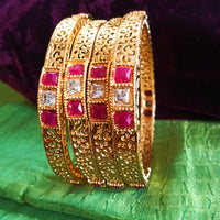 B0221_Beautiful golden bangles with delicate craftwork with a touch of stones.