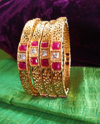 B0221_Beautiful golden bangles with delicate craftwork with a touch of stones.