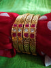 B0221_Beautiful golden bangles with delicate craftwork with a touch of stones.