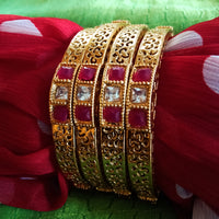 B0221_Beautiful golden bangles with delicate craftwork with a touch of stones.