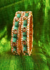 B0218_Gorgeous bangles with vibrant Meena work with a touch of semi precious stones.