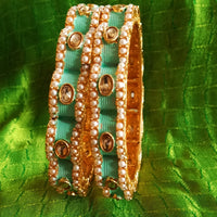 B0218_Gorgeous bangles with vibrant Meena work with a touch of semi precious stones.