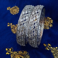 B0158_Elegant design silver crafted bangle studded with American Diamond stones.