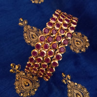 B0154_Elegant pink ruby studded bangles with fine stone work.