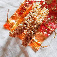 B0222_Lovely golden pearl bangles with delicate craftwork embellished with a bunch of pearls.