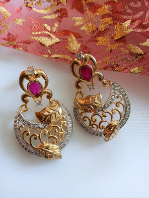 E0646_Classy earrings with delicate stone work of American Diamond & leafy designs with a touch of pink stones.
