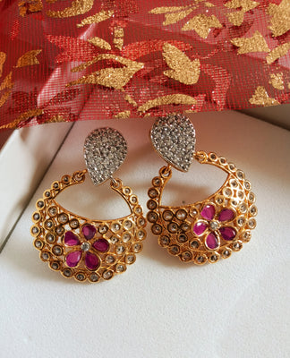E0645_Classy ring shaped earrings with delicate stone work of American Diamond stones with a touch of pink stones.