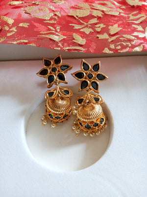 E0631_Gorgeous Golden color jumkas with delicate work of black stones with atouch of pearls.