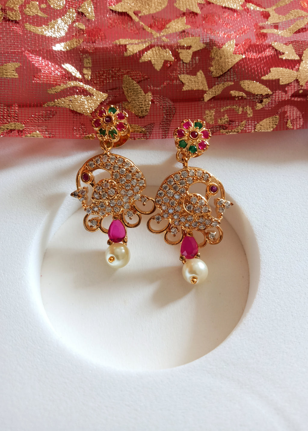 E0667_Beautiful crafted peacock design earrings studded with