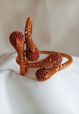 B0121_Classy traditional style bangle studded with pink ruby stones.