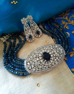 N0116_Classy blue crystal choker necklace set studded  with  American diamond stones.
