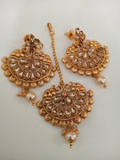 M018_Beautiful design golden color earring & maang tika combo with delicate work with a touch of pearl drop.