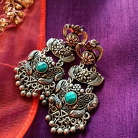 E0847_ Classy crafted pattern German silver oxidized danglers with a touch of stones along with bead drops.