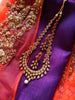 N0349_Elegant Temple jewelry style matte gold polish necklace set studded with American Diamond  stones with a touch of pink ruby stones.