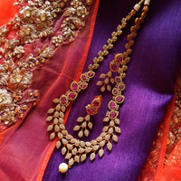 N0349_Elegant Temple jewelry style matte gold polish necklace set studded with American Diamond  stones with a touch of pink ruby stones.