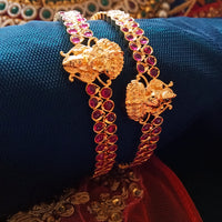 B0229_Traditional style lakshmi design golden bangles with a touch of  pink ruby stones.