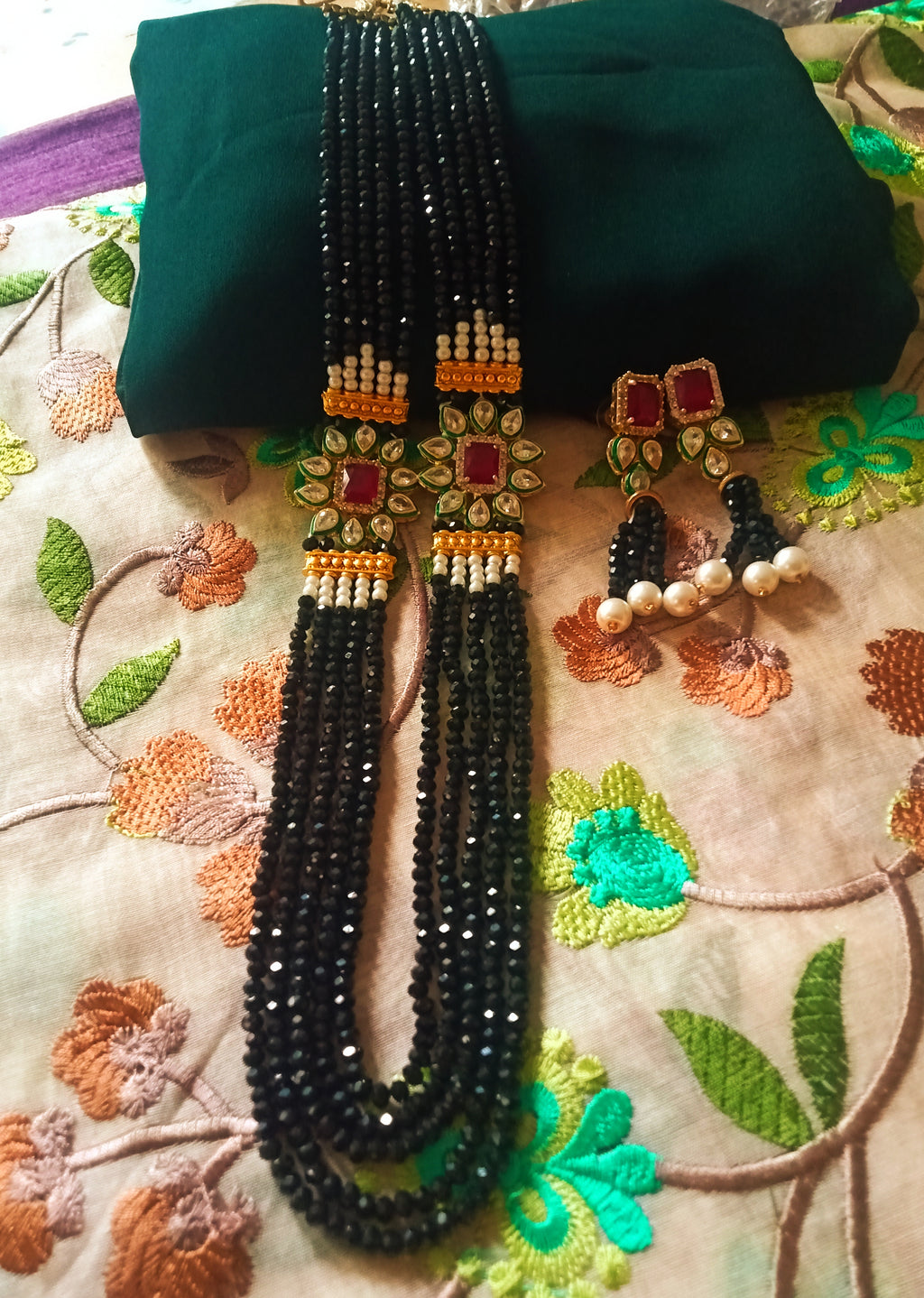 N0128_Gorgeous black Crystal necklace set studded with kundan stones.