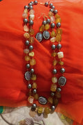 N015_Gorgeous pebble work necklace studded with semi precious stones.