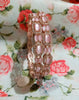 B0231_Elegant Rose Gold bangles embellished with American Diamond stones with a touch of dazzling pink stones.