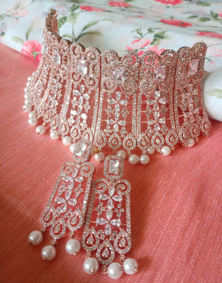 N0358_Ravishing broad rose gold American Diamond engraved choker necklace with delicate craft work with a touch of pearl drops.