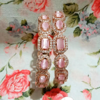 B0178_S_Elegant Rose Gold bangles embellished with American Diamond stones with a touch of dazzling pink stones.