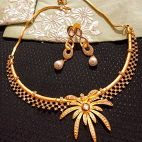 N01_Elegant Necklace studded with American Diamond with base Golden color.