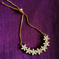 B0234_Lovely flower design bracelets studded with american diamond stones.