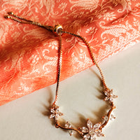 B0237_Dazzling floral design bracelets studded with delicate work of american diamond stones.