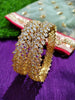 B014_Classy Style Gold Plated Bangles studded  with American Diamond stones.