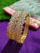 B014_Classy Style Gold Plated Bangles studded  with American Diamond stones.