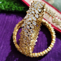 B014_Classy Style Gold Plated Bangles studded  with American Diamond stones.