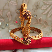B069_Gorgeous Gold plated bangles studded with pink ruby stones.