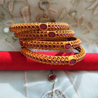 B0242_Classic style gorgeous Gold plated bangles studded with pink ruby stones.
