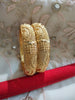 B0244_Classic Gold plated bangles with delicate craft work.