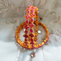 B0243_Classic sleek style gorgeous Gold plated bangles studded with pink ruby stones.