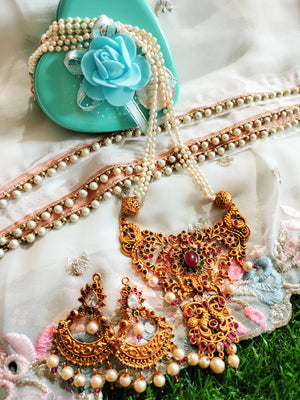 N0150_Elegant Matte Gold polish Temple jewelry style  Necklace set studded with pink & green ruby stones.