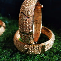 B0249_Gorgeous broad Traditional style Gold plated bangles with delicate craft work.
